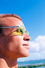 man wearing glasses in the sun