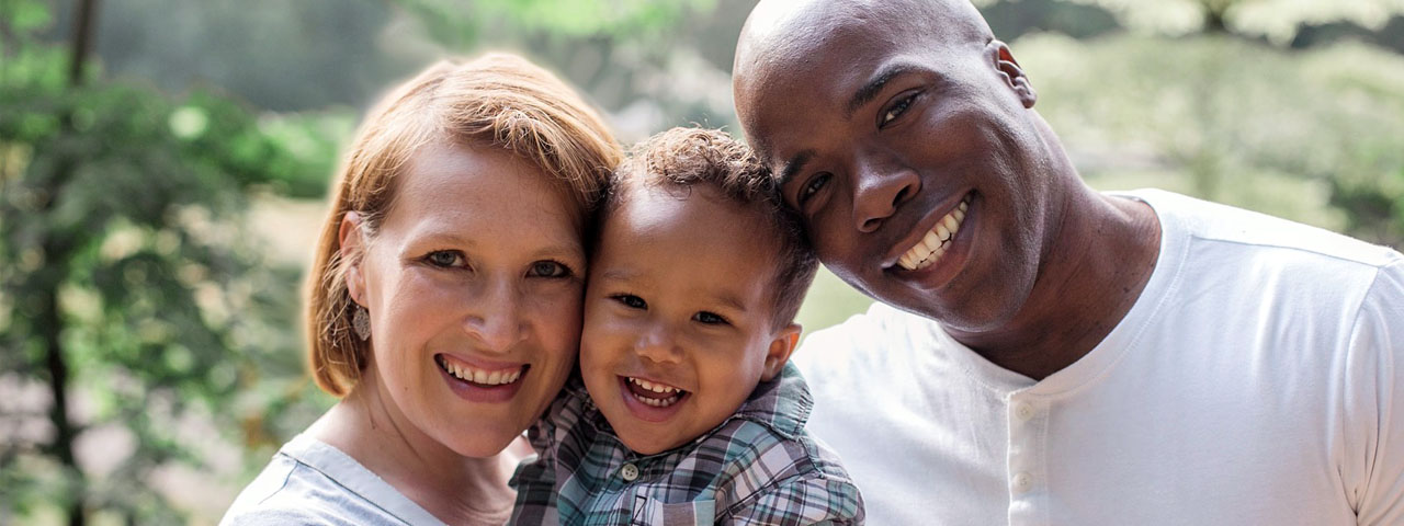 Mother Father and Son, multicultural family. It's worth preventing vision loss with early diagnosis of eye disease.