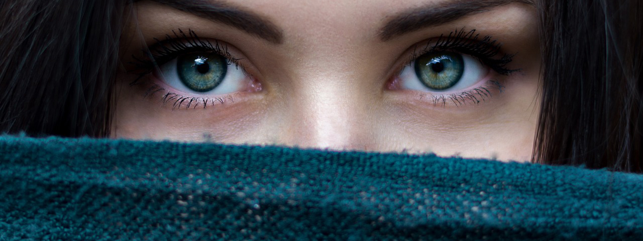 Woman Pretty Eyes, Long Eyelashes wearing Sweater