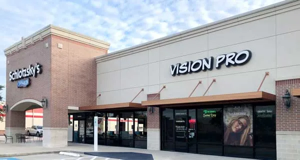 Exterior of Vision Pro Eyecare clinic in a shopping center