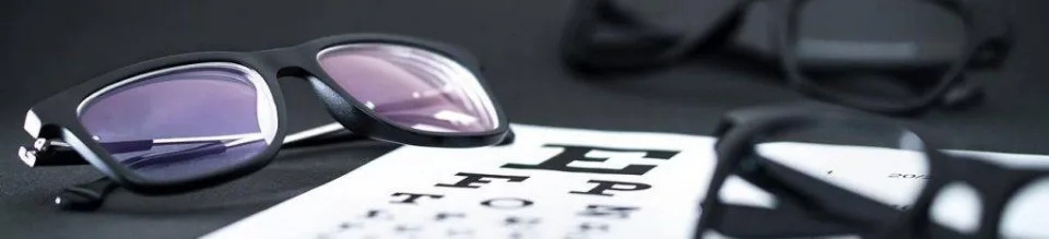 Glasses On Eye Sight Test Chart exam banner 1318x300